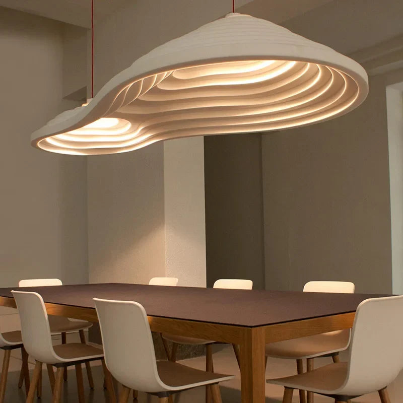Sculptural Ribbed Wave Pendant Light Amberon – Lifestyle Long Table View