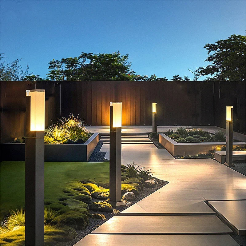 Modern Aluminium Garden Path Light Evmora - row of lights along a stone garden path at dusk