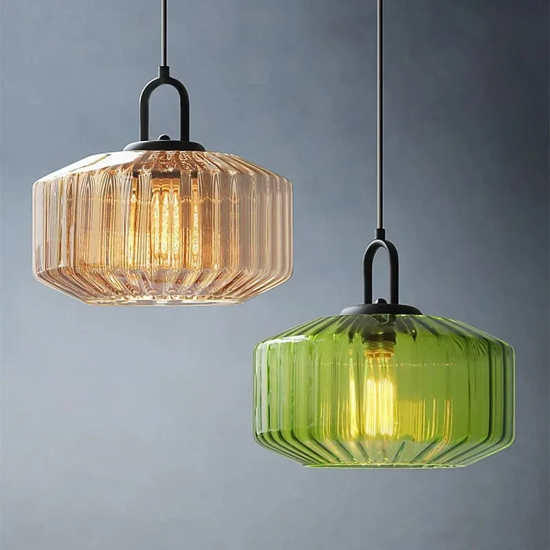 Amber and Green ribbed blown glass pendant light Rivenex side by side