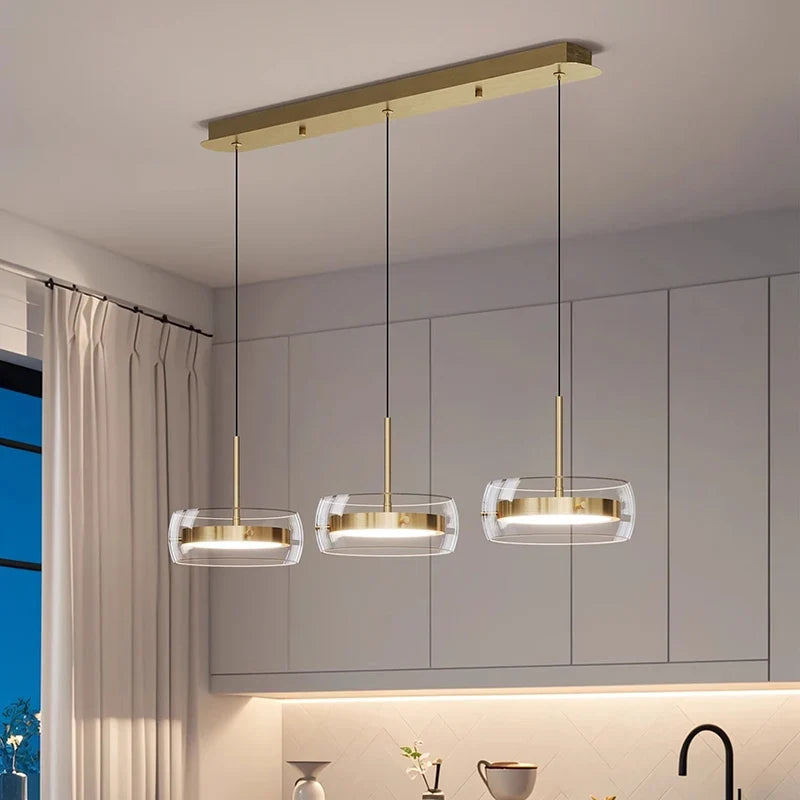 Bsaelix pendant chandelier, 3-light configuration, gold finish, kitchen counter