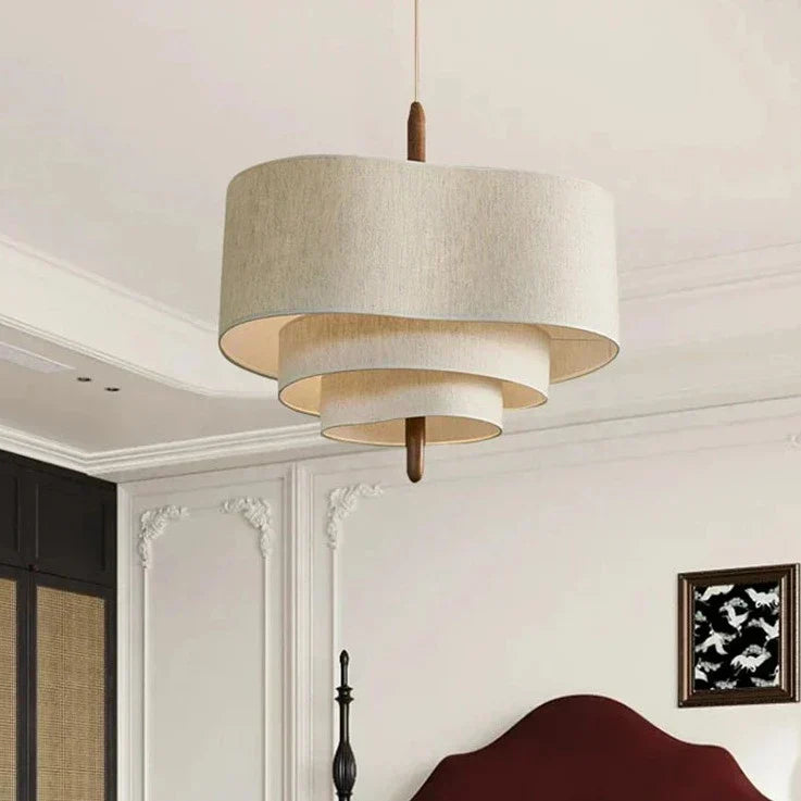 Nordic Tiered Fabric Pendant Light – Daselion above a bed, close view
