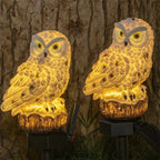 Sculptural Resin Owl Solar Garden Light – Strigora, Brown pair lit at night