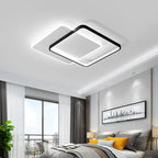 Orvena square ceiling light in a bright modern bedroom with city-print artwork