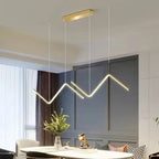 Zendrax angular zigzag LED pendant light in matte black above a kitchen island