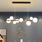 Sculptural Alloy Linear Chandelier Morvelia – Black Frame, Frosted Opal Glass, Lifestyle
