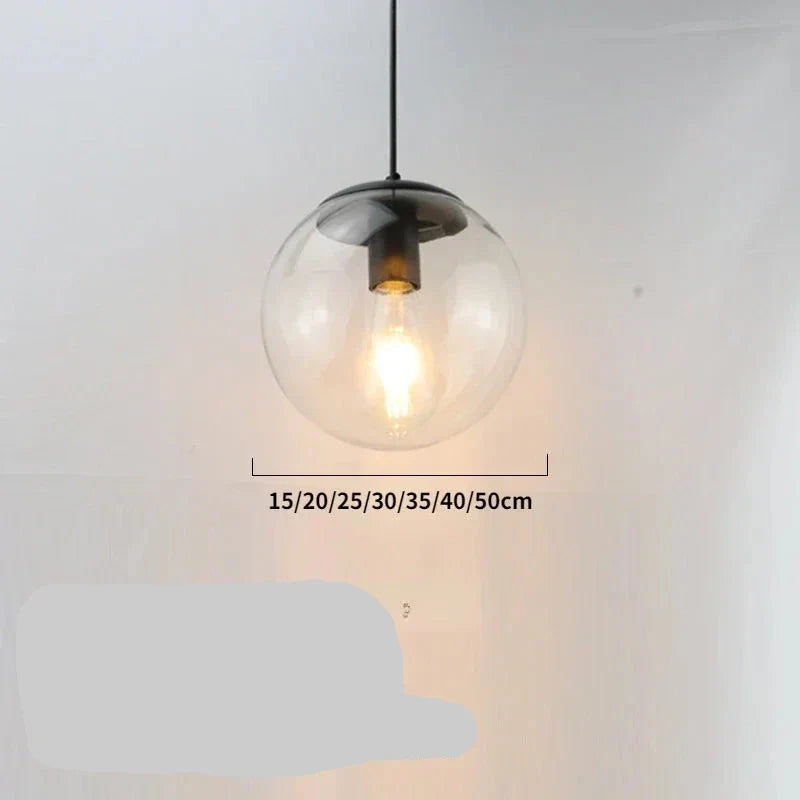 Warm Amber Glass Metal Pendant Light Corvane – Lifestyle View 4