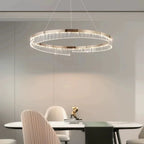 Ecelvor crystal bar ring LED chandelier over marble dining table in champagne gold