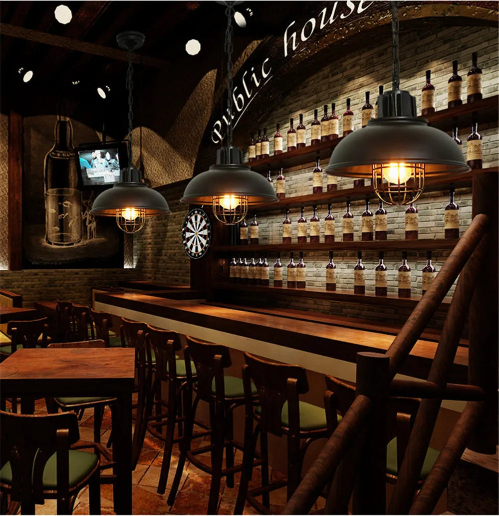 Caldorix Caged Dome pendant in Black finish over a pub bar