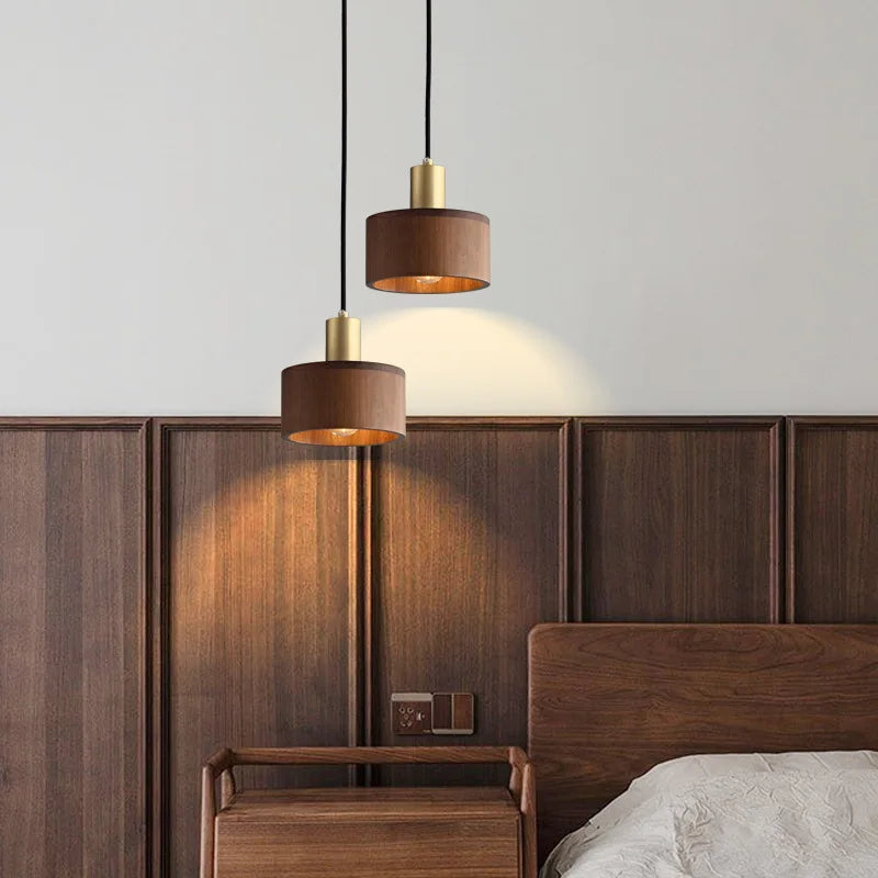 Close-up of Waelvix walnut wood shade grain with brass hardware