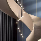 Prismex spiral cascade chandelier in Black following a curved staircase