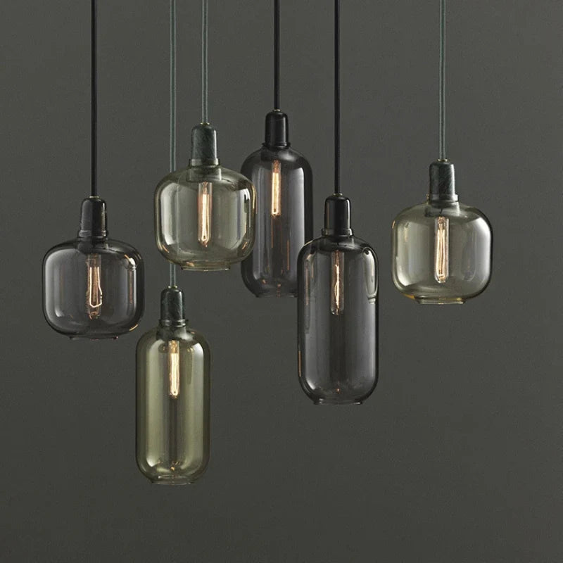 Czaelindra pendant light – multiple finishes grouped, smoke and amber glass with marble sockets