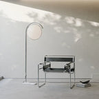 Elegant Sculptural Arc Floor Lamp Delvanthos – Sunlit Interior Detail