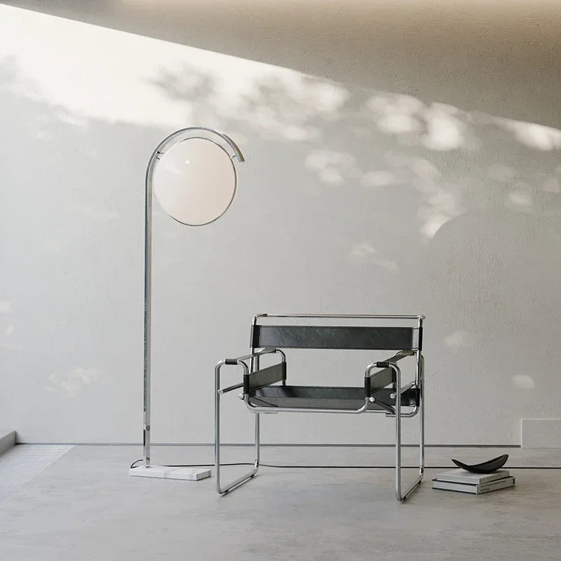 Elegant Sculptural Arc Floor Lamp Delvanthos – Sunlit Interior Detail