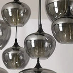 Quintara pendant – hand-blown glass texture and E27 bronze socket detail