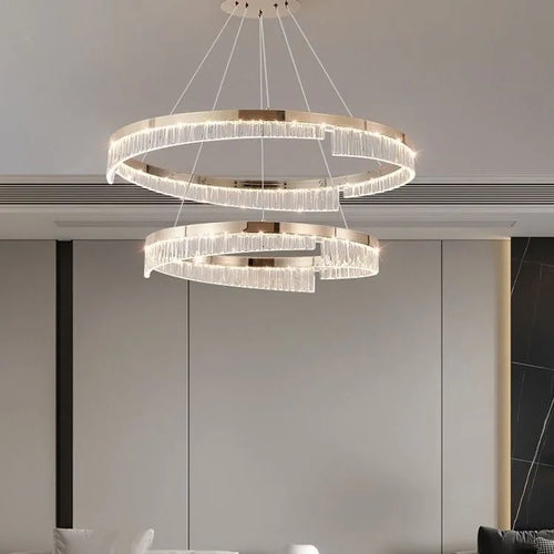 Ecelvor double-ring crystal bar LED chandelier, 60 and 80cm rings, champagne gold, over lounge