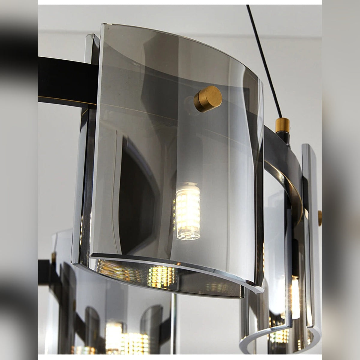 Close-up detail of Kelrix Smoke Grey glass shade and G9 LED bulb