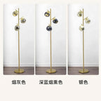 Ambris floor lamp finish comparison, smoke-gray, dark blue, and silver globes