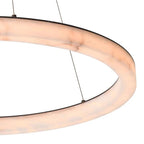 Selion — detail of the continuous marble-effect ring and slim suspension cables