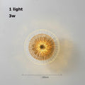 Iralux wall sconce, single amber glass disc, 20cm
