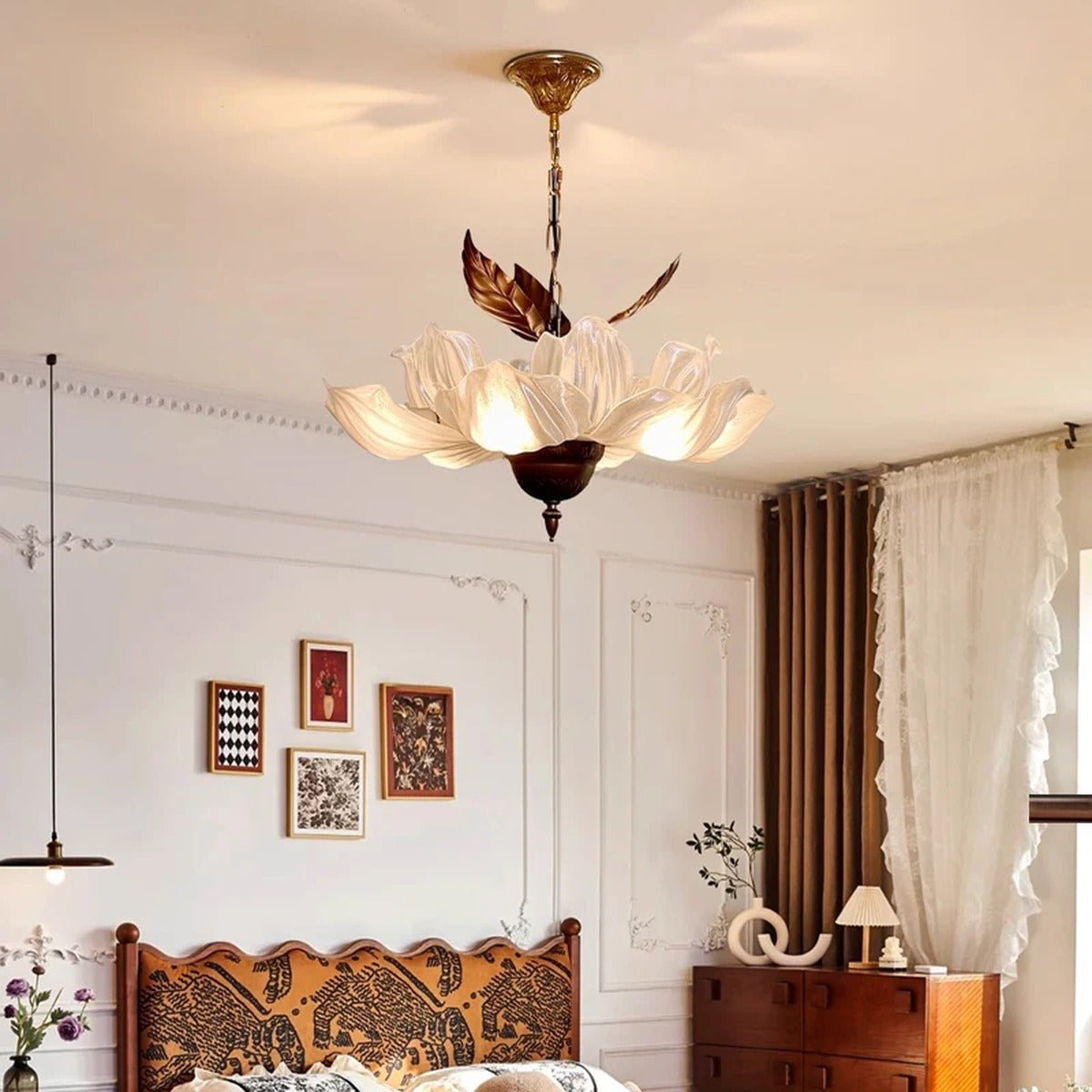 Florevian petal chandelier above a bedroom headboard