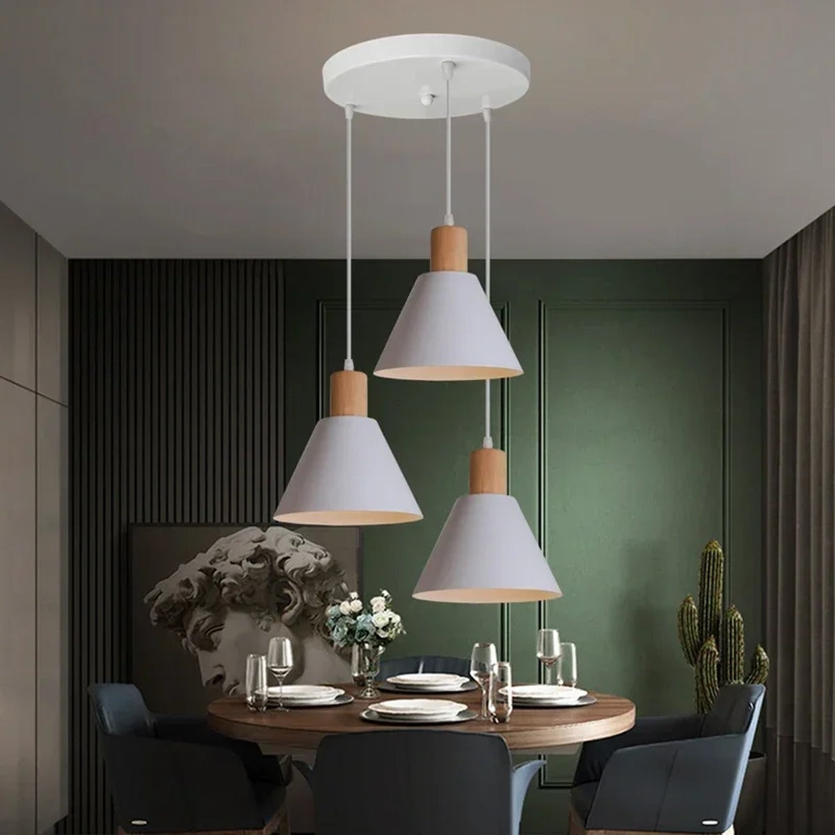 Ulion nordic cone shade 3-pendant ceiling light — white version above round dining table in green-accent room