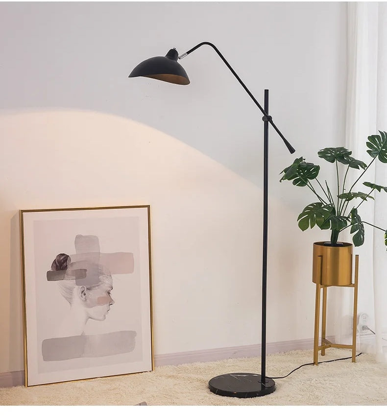 Aurevon black floor lamp with marble base in a minimalist living room