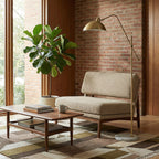 Aurevon gold floor lamp with marble base in a modern living room