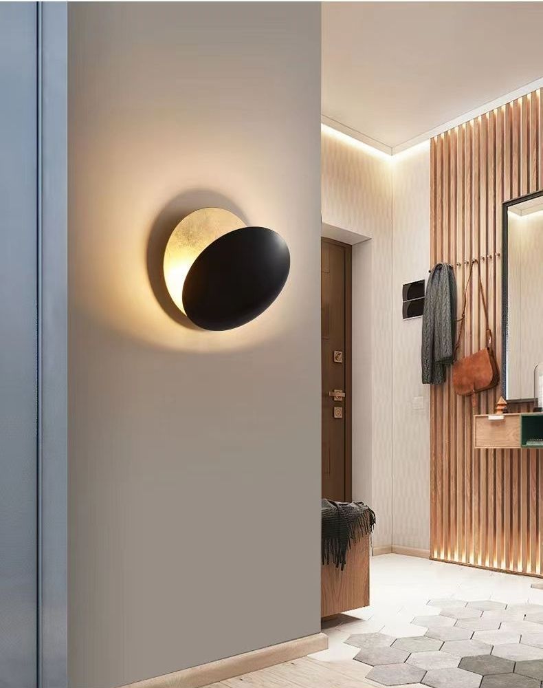 Eclipse Disc Wall Sconce Auselon - Black and Brass finish, hallway installation