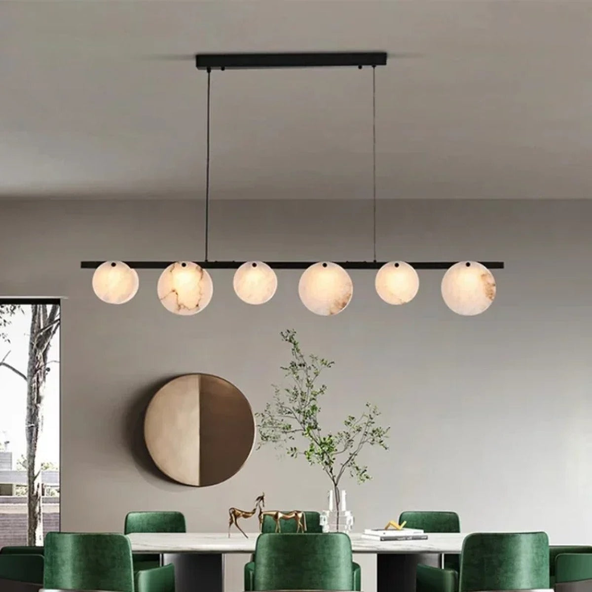 Alabaster Disc Linear Chandelier Torivax — styled dining room