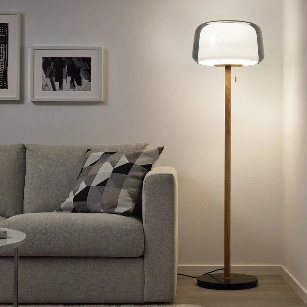 Minimalist Smoked Glass Floor Lamp Quieton — lifestyle view beside sofa