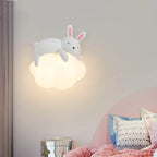 Softholm rabbit on cloud wall sconce - lifestyle view in bedroom
