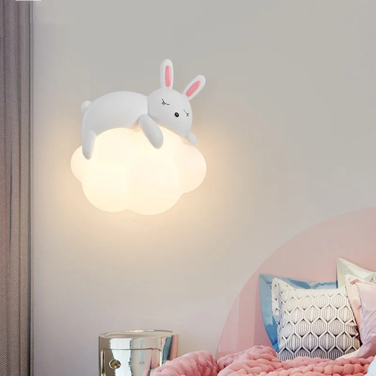 Softholm rabbit on cloud wall sconce - lifestyle view in bedroom