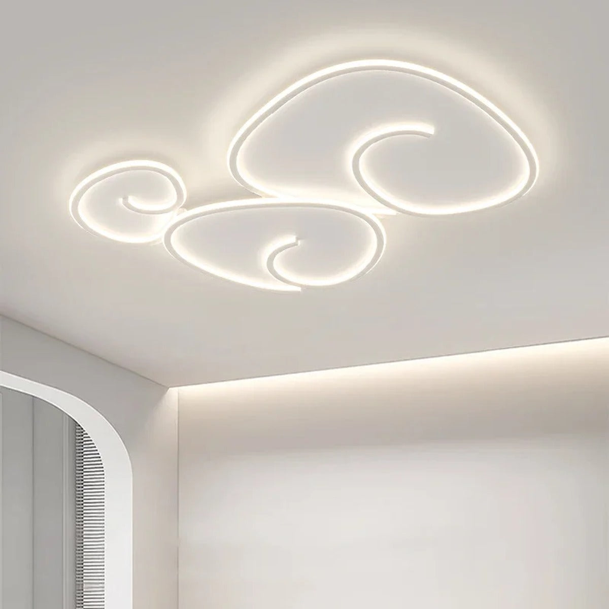 Praixion sculptural ring LED ceiling light, Round Triple Ring, white, installed in bedroom