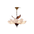 Florevian chandelier detail — bronze leaf accent and acrylic petals
