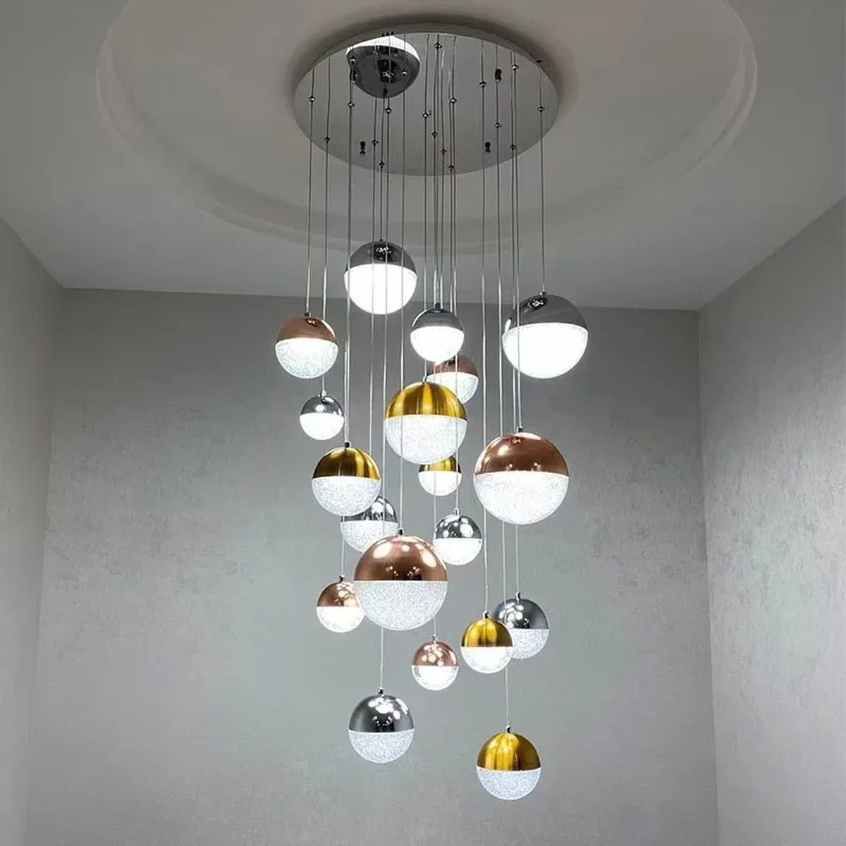 Sand-Textured Crystal Sphere Chandelier Orvenna — grand staircase installation