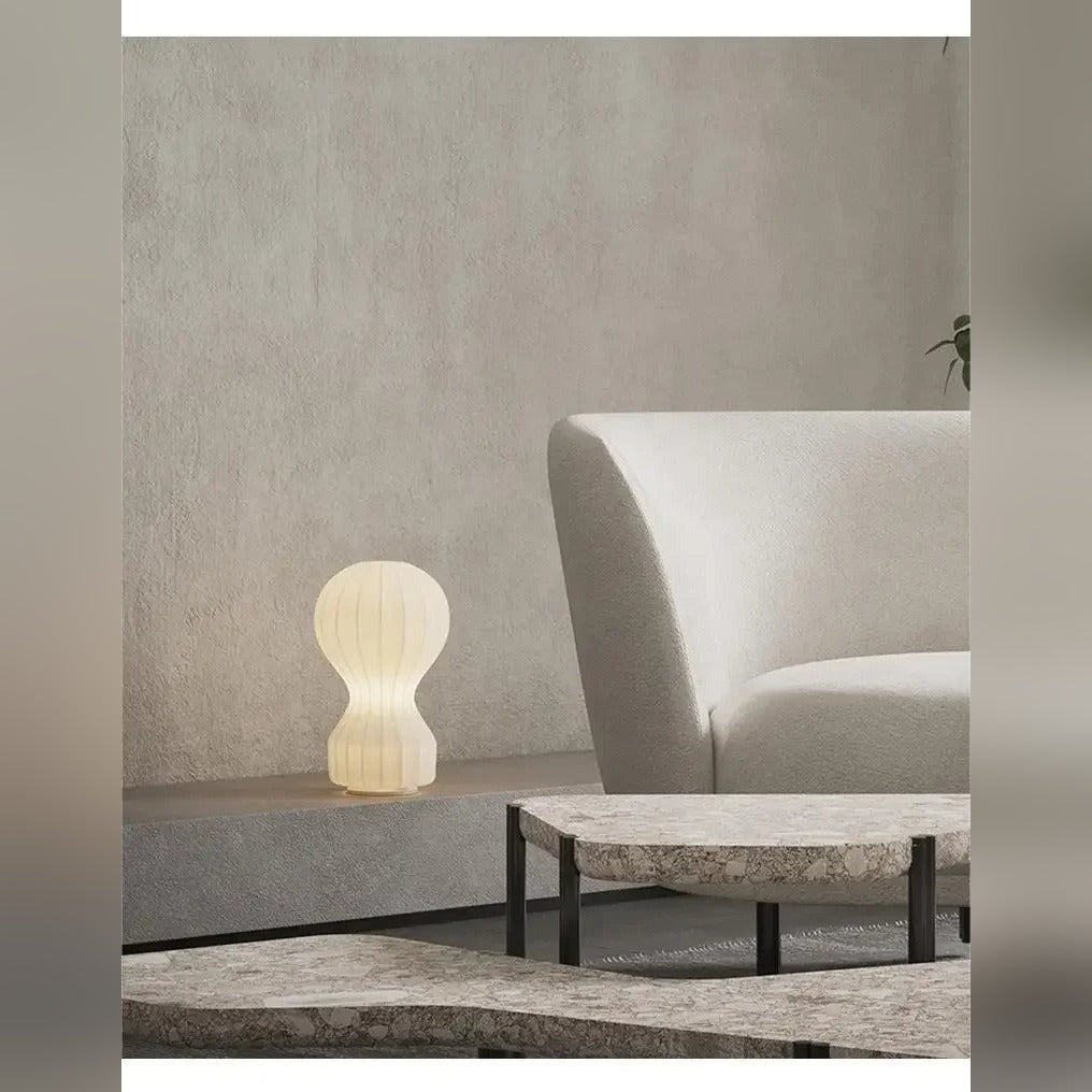 Shirokaze Medium table lamp beside a boucle sofa in a contemporary living room