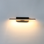Binova wall sconce in Matte Black installed above a bathroom vanity mirror