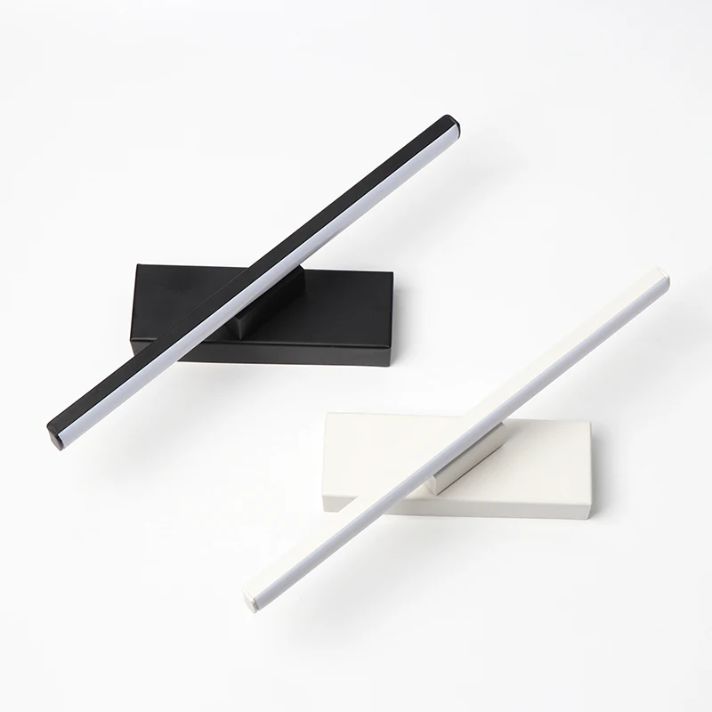 Binova wall sconce rotated to a 330 degree angle, Matte Black and White finishes compared