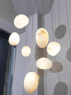 Byaelon alabaster pebble pendant light - D200H177mm - lifestyle stairwell