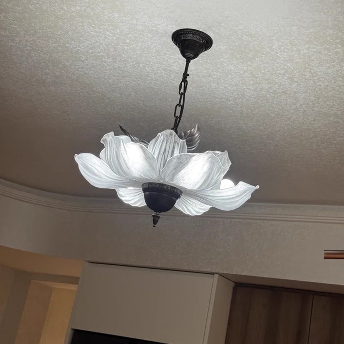 Florevian frosted acrylic petal chandelier — lifestyle view