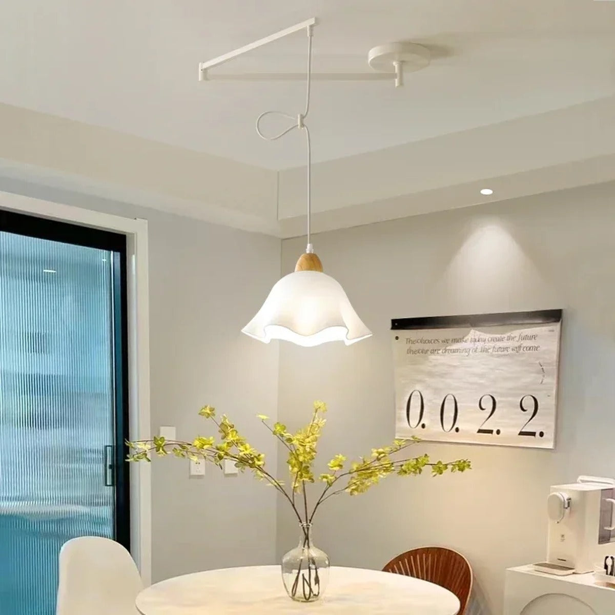 Swing-Arm Pendant Light – Galrex – Classic shade in white, lifestyle view over dining table