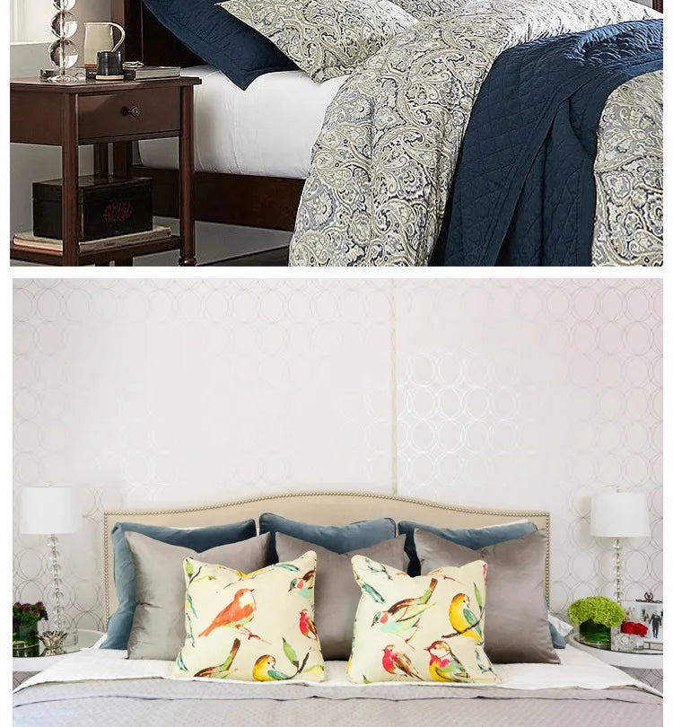 Calyra crystal ball table lamp on nightstand beside bed with navy paisley bedding