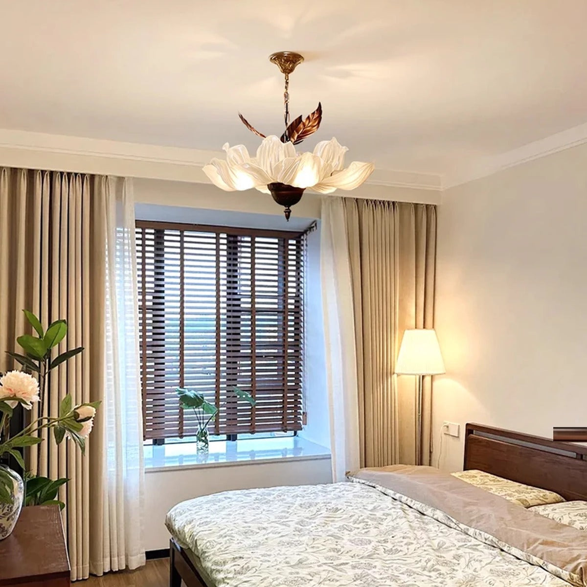 Florevian petal chandelier in a bedroom setting