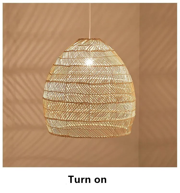 Ktaelindra pendant — illuminated, warm rattan glow