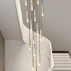 Cletya Prismarc gold cylinder cluster pendant chandelier with multiple slender brushed gold tubes