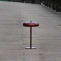 Cmoona minimalist disc metal table lamp – Crimson Red on wooden outdoor surface
