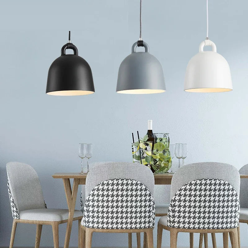 Relavorn resin bell pendant light — Black, Dark Gray and White above a dining table