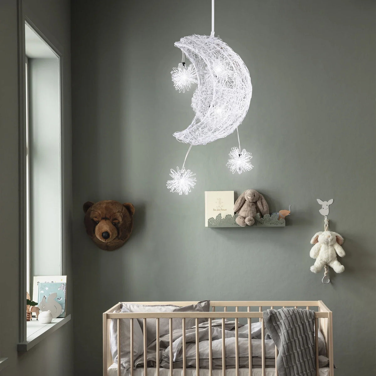 Csaelinth Moon Pendant in a Nursery