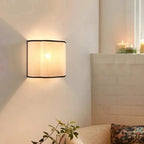 Curved Linen Half-Drum Wall Sconce – Elriven – Lifestyle View 2