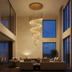 Prismex spiral cascade chandelier in Gold above a double-height living room